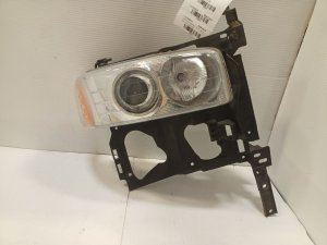 2001-2006 GMC Yukon Halogen Projector Headlight Assembly - Right (Passenger) (Used OEM)