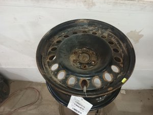 2005-2015 Nissan Xterra Black 16x7 18-Hole Steel Spare Wheel (Used OEM)