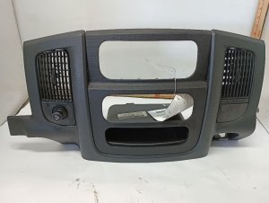 2002-2005 Dodge Ram 1500 Black Radio and Vent Instrument Panel Bezel (Used OEM)