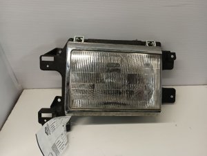 1987-1991 Ford Bronco Headlight Assembly - Left (Driver) (Used OEM)
