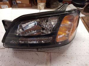 2000-2004 Subaru Outback Headlight Assembly with Black Horizontal Bar - Left (Driver) (Used OEM)