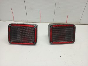 2007-2018 Jeep Wrangler Smoked Taillight Assembly - Left (Driver) (Used OEM)