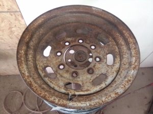 1999-2004 Ford F-250 White 16-Inch 8-Slot Steel Wheel (Used OEM)