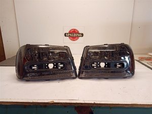 2002-2006 Chevrolet Trailblazer EXT Smoked Aftermarket Smoked Headlight Assembly Pair - Left (Driver) (Used OEM)