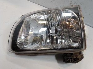 2001-2004 Toyota Tacoma Headlight Assembly - Left (Driver) (Used OEM)