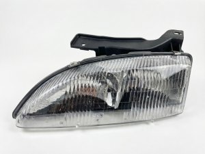 1995-1999 Chevrolet Cavalier Composite Halogen Headlight Assembly - Left (Driver) (Used OEM)
