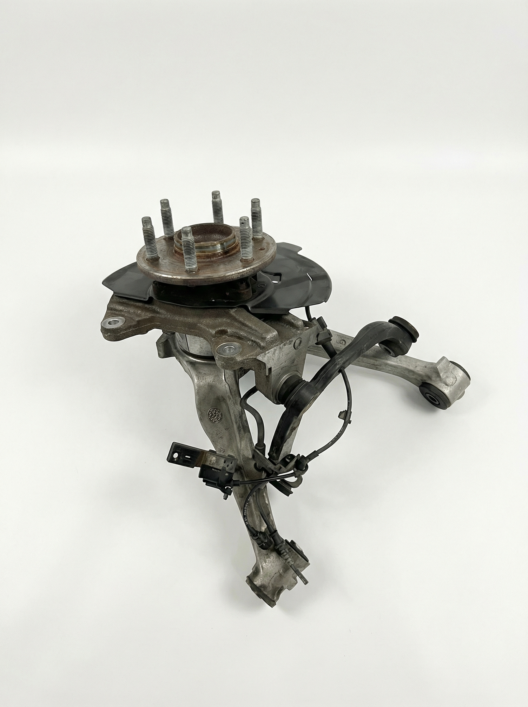 2009-2013 Chevrolet Avalanche Front Steering Knuckle and Cast Iron Lower Control Arm Assembly - Left (Driver) (Used OEM)