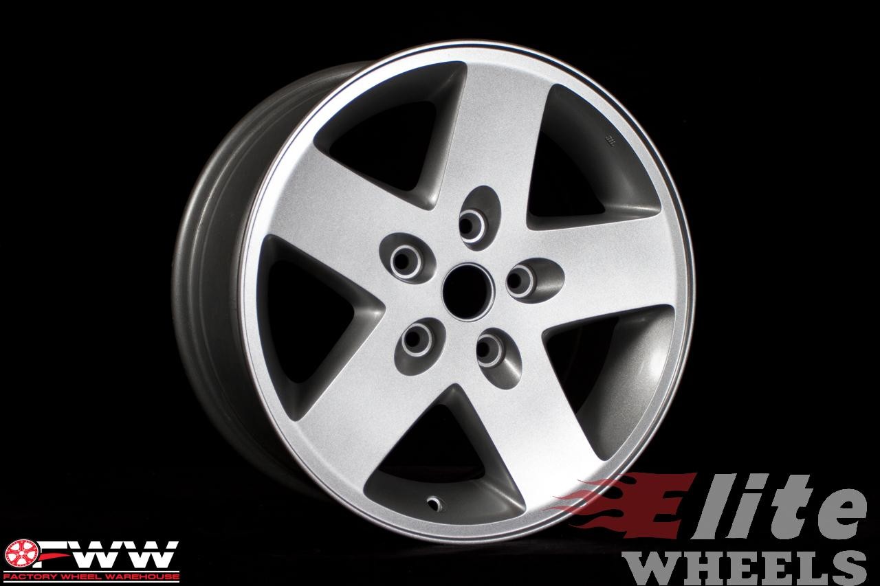 2010-2013 Jeep Wrangler Black Charcoal Painted Alloy Wheel (Remanufactured OEM)