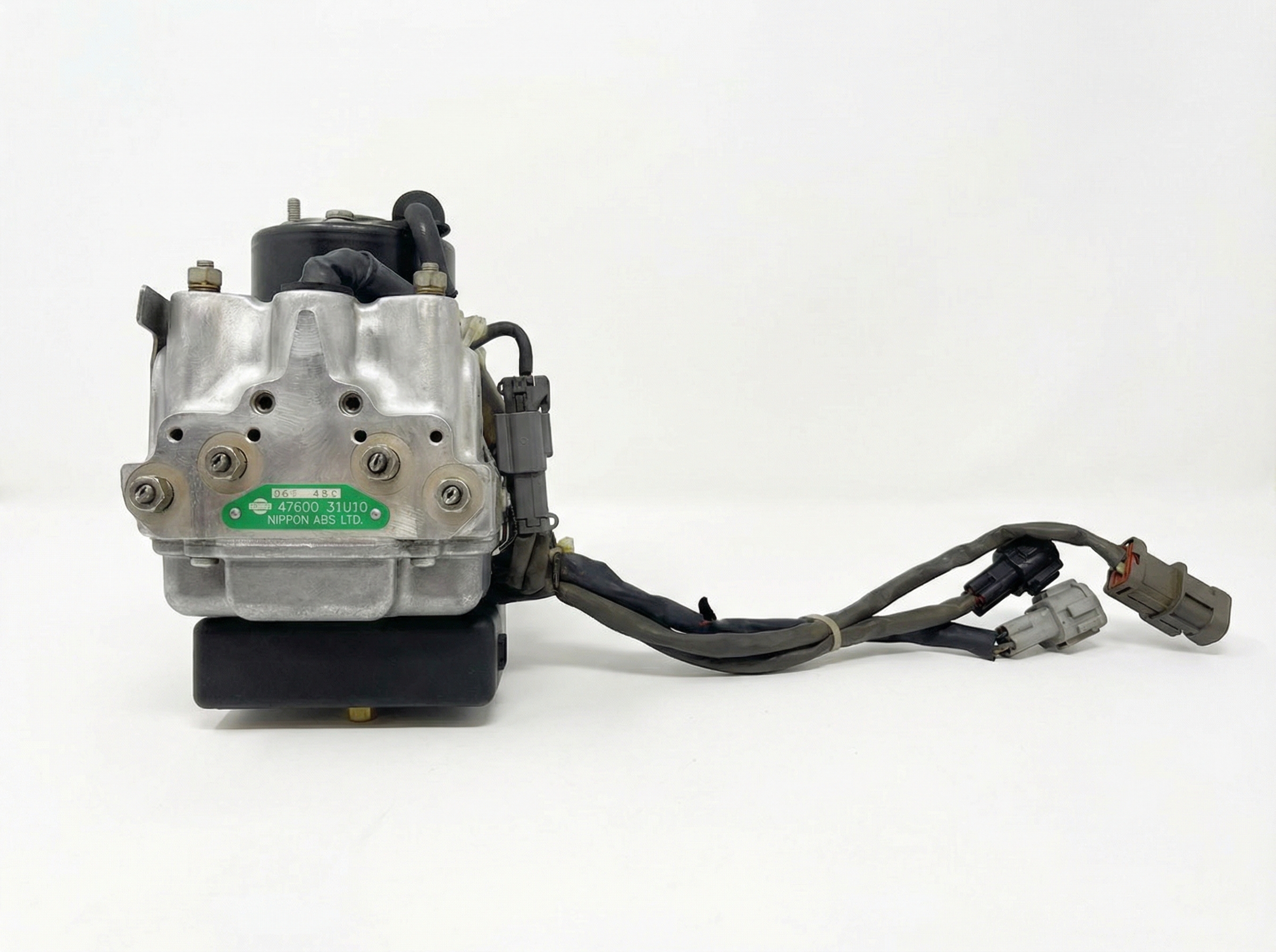 1995-1996 Nissan Maxima ABS Pump and Control Module Assembly (Used OEM)