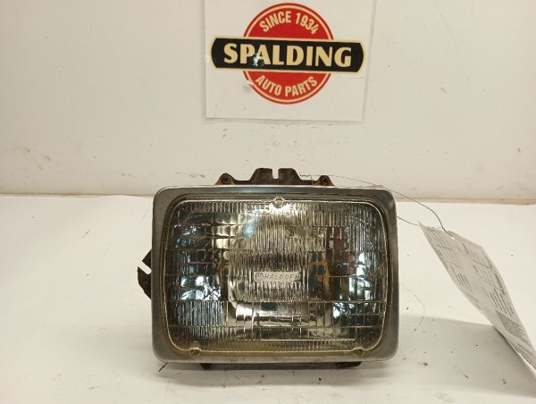 OEM Capsule Headlight Assembly for 1997, 1998, 1999, 2000, 2001, 2002, 2003, 2004, 2005, 2006, 2007, 2008, 2009, 2010, 2011, 2012, 2013, 2014, 2015, 2016, 2017 Ford - Left (Driver)